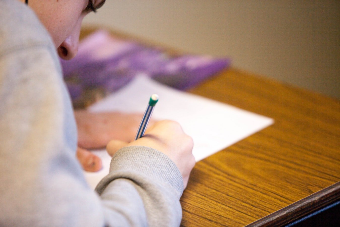 student taking test to illustrate how frustrated kids are with tests