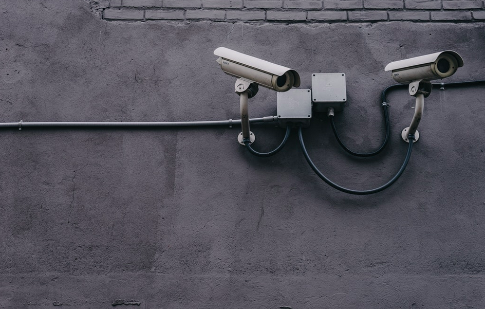 surveillance cameras mounted on a wall