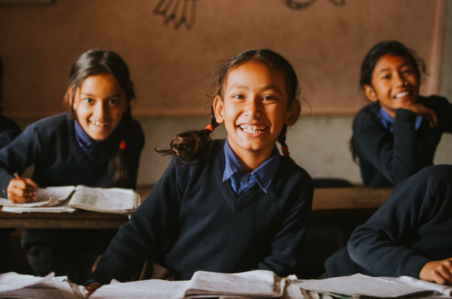 Students smiling in the best interests
