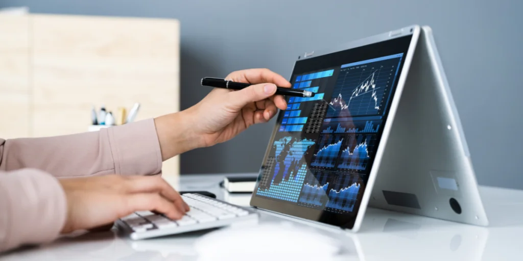 Person looking at data on laptop